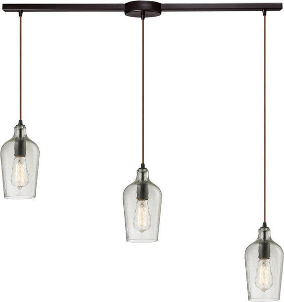 Hammered Glass 3 Light Pendant In Oil Rubbed Bronze and Clear Glass